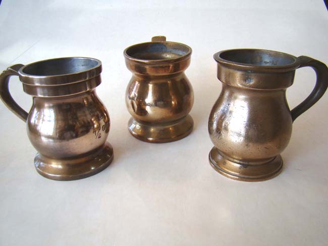 A group of three antique English bronze half-gill tavern measures circa 1880